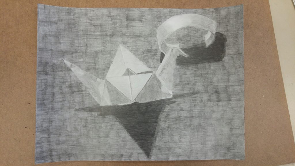 A pencil drawing of an origami crane and a paper curl