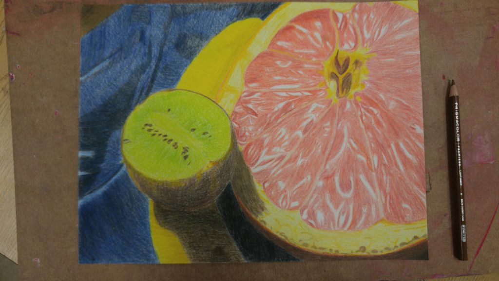 Drawing in colored pencil of a halved grapefruit, next to a yellow squash, with a halved kiwi on top, on a blue background